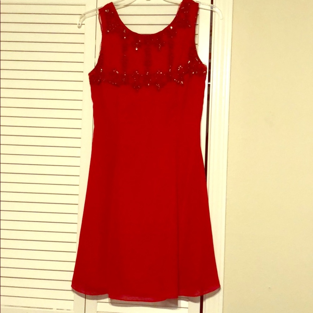 Stunning A-Line size 10 red dress with bow in back